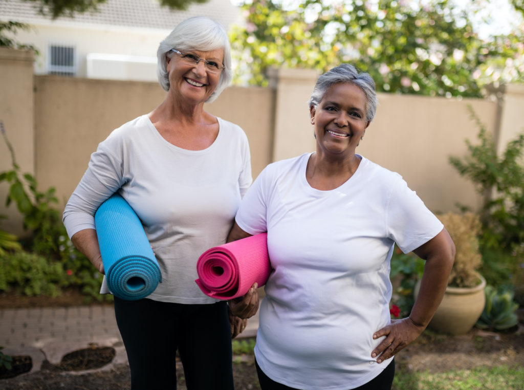 Senior women at yoga class